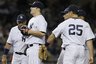New York Yankees third baseman Alex Rodriguez, left, and first baseman Mark Teixeira (25) give support to starting pitcher Phil Hughes, second from right, who allowed five runs to the Baltimore Orioles in the fifth inning of a baseball game at Yankee Stadium, Thursday, April 14, 2011, in New York. (AP Photo/Kathy Willens)