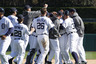 DETROIT, MI - APRIL 12:  Miguel Cabrera #24 of the Detroit Tigers is mobbed by teammates after hitting a RBI single in the bottom of the ninth inning to beat the Texas Rangers 5-4 at Comerica Park on April 12, 2025 in Detroit, Michigan.  (Photo by Gregory Shamus/Getty Images)