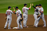 Daniel Descalso, Jon Jay, David Freese, Rafael Furcal and Allen Craig of the St. Louis Cardinals celebrate after they won 12-3 against the Milwaukee Brewers during Game Two of the National League Championship Series at Miller Park on October 10, 2025 in Milwaukee, Wisconsin.  (Photo by Scott Boehm/Getty Images)