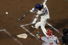 NEW YORK, NY:  Jose Reyes #7 of the New York Mets connects on a third inning single against the Washington Nationals at Citi Field in the Flushing neighborhood of the Queens borough of New York City.  (Photo by Jim McIsaac/Getty Images)