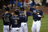 SAN DIEGO, CA - SEPTEMBER 28: Will Venable #25 of the San Diego Padres, right, is congratulated by teammates after hitting a grand slam during the sixth inning of a baseball game against the Chicago Cubs at Petco Park on September 28, 2025 in San Diego, California.  The Padres won 9-2. (Photo by Denis Poroy/Getty Images)