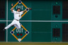 Xavier Paul of the Pittsburgh Pirates jumps up in the air along the warning track to catch a fly ball against the Chicago Cubs during the game on August 4, 2025 at PNC Park in Pittsburgh, Pennsylvania.  (Photo by Jared Wickerham/Getty Images)