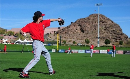 February 26, 2012; Tempe, AZ, USA; Los Angeles Angels starting pitcher Dan Haren (24) throws the baseball during spring training at Tempe Diablo Stadium. Mandatory Credit: Kyle Terada-US PRESSWIRE