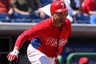 Clearwater, FL, USA; Philadelphia Phillies third baseman Placido Polanco hits an RBI single against the Atlanta Braves at Bright House Networks Field.  Credit: Kim Klement-US PRESSWIRE