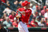 Goodyear, AZ, USA; Cincinnati Reds first baseman Joey Votto (19) singles during the first inning against the Chicago White Sox at Goodyear Ballpark.  Mandatory Credit: Jake Roth-US PRESSWIRE