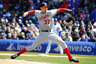 Chicago, IL, USA; Washington Nationals starting pitcher Stephen Strasburg delivers a pitch during the first inning against the Chicago Cubs on opening day at Wrigley Field.  Mandatory Credit: Rob Grabowski-US PRESSWIRE