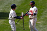 Orlando Cabrera of the Cleveland Indians trades his broken bat for a new one with the bat boy during the game against the Baltimore Orioles at Progressive Field in Cleveland, Ohio.  (Photo by Jared Wickerham/Getty Images)