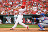 ST. LOUIS, MO: Matt Carpenter of the St. Louis Cardinals hits an RBI single against the Chicago Cubs at Busch Stadium in St. Louis, Missouri.  Both teams wore the number 42 in honor of Jackie Robinson Day.  The Cardinals beat the Cubs 10-3.  (Photo by Dilip Vishwanat/Getty Images)