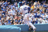 LOS ANGELES, CA:  Matt Kemp of the Los Angeles Dodgers rounds the bases after hitting a home run in the third inning during the MLB game against the San Diego Padres at Dodger Stadium in Los Angeles, California. Both teams wore the number 42 in honor of Jackie Robinson Day. (Photo by Victor Decolongon/Getty Images)