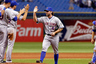 Pitcher R.A. Dickey #43 of the New York Mets is congratulated after his one hit complete game against the Tampa Bay Rays at Tropicana Field in St. Petersburg, Florida.  (Photo by J. Meric/Getty Images)