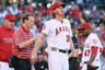 ANAHEIM, CA - MAY 28:  Starting pitcher Jered Weaver #36 of the Los Angeles Angels of Anaheim is attended to after injuring himself, as manager Mike Scioscia (L) and Howard Kendrick (R) #47 look on in the first inning against the New York Yankees at Angel Stadium of Anaheim on May 28, 2025 in Anaheim, California.  (Photo by Jeff Gross/Getty Images)
