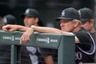 Manager Jim Tracy of the Colorado Rockies looks on from the dugout as his team faces the Oakland Athletics during Interleague Play at Coors Field in Denver, Colorado.  (Photo by Doug Pensinger/Getty Images)