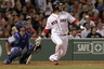 BOSTON, MA: Jarrod Saltalamacchia #39 of the Boston Red Sox and Jeff Mathis #6 of the Toronto Blue Jays watch the flight of Saltalamacchia's home run in the seventh inning at Fenway Park in Boston, Massachusetts.  (Photo by Jim Rogash/Getty Images)