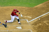 Phoenix, AZ, USA; Arizona Diamondbacks second baseman Aaron Hill (2) hits an RBI single during the sixth inning against the Chicago Cubs at Chase Field. The Diamondbacks beat the Cubs 5-1.  Mandatory Credit: Matt Kartozian-US PRESSWIRE