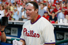 PHILADELPHIA, PA - JUNE 23: Jim Thome #25 of the Philadelphia Phillies wipes his face after a teammate hit him with a shaving cream pie after  Thome hit a home run to win the game against the Tampa Bay Rays at Citizens Bank Park on June 23, 2025 in Philadelphia, Pennsylvania. The Phillies won 7-6. (Photo by Brian Garfinkel/Getty Images)