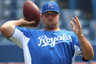 Toronto, ON, Canada; Kansas City Royals pitcher Jonathan Broxton throws a football before playing against the Toronto Blue Jays at the Rogers Centre. Credit: Tom Szczerbowski-US PRESSWIRE