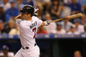 American League All-Star Joe Mauer of the Minnesota Twins hits a single in the ninth inning during the 83rd MLB All-Star Game at Kauffman Stadium in Kansas City, Missouri.  (Photo by Jonathan Daniel/Getty Images)