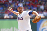 Colby Lewis #48 of the Texas Rangers delivers a pitch against the Houston Astros during an interleage game at Rangers Ballpark in Arlington in Arlington, Texas. (Photo by Rick Yeatts/Getty Images)