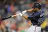 WASHINGTON, DC: Michael Bourn #24 of the Atlanta Braves hits a triple in the ninth inning against the Washington Nationals at Nationals Park in Washington, DC. (Photo by Greg Fiume/Getty Images)