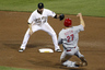 Neil Walker #18 of the Pittsburgh Pirates tags out Scott Rolen #27 of the Cincinnati Reds during the game at PNC Park in Pittsburgh, Pennsylvania.  The Pirates defeat the Reds 3-2.  (Photo by Justin K. Aller/Getty Images)