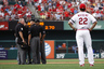 Mike Matheny of the St. Louis Cardinals looks on as the umpires discuss a home run by Carlos Beltran of the St. Louis Cardinals against the Milwaukee Brewers at Busch Stadium in St. Louis, Missouri.  (Photo by Paul Nordmann/Getty Images)