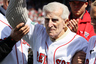 Former Boston Red Sox Johnny Pesky greets the fans before the home opener between the Boston Red Sox and the Tampa Bay Rays at Fenway Park in Boston, Massachusetts.  (Photo by Elsa/Getty Images)