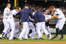 Seattle, WA, USA; The Seattle Mariners celebrate after defeating the Minnesota Twins at Safeco Field. Seattle defeated Minnesota 3-2. Credit: Steven Bisig-US PRESSWIRE