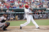 Aug 22, 2012; Arlington, TX, USA; Texas Rangers third baseman Adrian Beltre (29) hits a home run during the second inning of the game against the Baltimore Orioles at Rangers Ballpark. Mandatory Credit: Tim Heitman-US PRESSWIRE