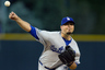 Starting pitcher Josh Beckett of the Los Angeles Dodgers delivers to home plate against the Colorado Rockies at Coors Field in Denver, Colorado.  (Photo by Justin Edmonds/Getty Images)