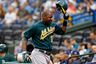 ST PETERSBURG, FL - First baseman Chris Carter #22 of the Oakland Athletics tips his hat to the crowd after his home run against the Tampa Bay Rays during the game at Tropicana Field.  (Photo by J. Meric/Getty Images)