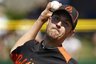 Baltimore Orioles pitcher Justin Duchscherer throws in the second inning of a spring training baseball game against the Philadelphia Phillies in Clearwater, Fla., Tuesday, March 8, 2011. (AP Photo/Gene J. Puskar)